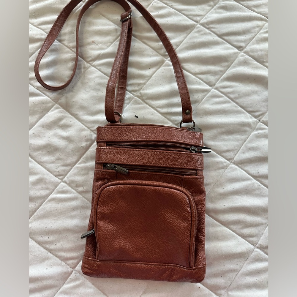 Multi pocket cross body faux leather purse